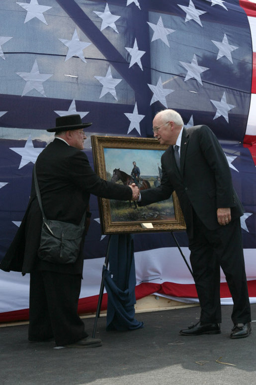 Re-enactment participant Jack Fishman presents Vice President Dick Cheney with an oil painting on September 19, 2008, depicting Cheney's great-grandfather Samuel Fletcher Cheney at the Battle of Chickamauga. Cheney's great-grandfather fought in the 1863 Civil War battle as a Captain in the 21st Ohio Volunteer Infantry. White House photo by David Bohrer