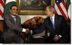 President George W. Bush shakes hands with President Asif Ali Zardari of Pakistan during their meeting Tuesday, Sept. 23, 2008, at The Waldorf-Astoria Hotel in New York. Said President Bush, "Pakistan is an ally, and I look forward to deepening our relationship. Your words have been very strong about Pakistan's sovereign right and sovereign duty to protect your country, and the United States wants to help."  White House photo by Eric Draper