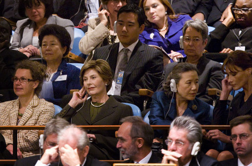 Mrs. Laura Bush listens from the audience as President George W. Bush delivers his address Tuesday, Sept. 23, 2008, to the United Nations General Assembly in at the U.N. Headquarters in New York City. Sitting with her from left are: Dr. Cheryl Benard, spouse of U.S. Ambassador to the United Nations Zalmay Khalilzad; Mrs. Yoo Soon-taek, spouse of U.N. Secretary-General Ban Ki-moon, and Mrs. Carla Bruni Sarkozy, spouse of French President Nicolas Sarkozy. White House photo by Chris Greenberg