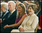 Mrs. Laura Bush and daughter Jenna Hager listen to author Jan Brett during the National Book Festival Breakfast Saturday, Sept. 27, 2008, in the East Room of the White House. White House photo by Joyce N. Boghosian