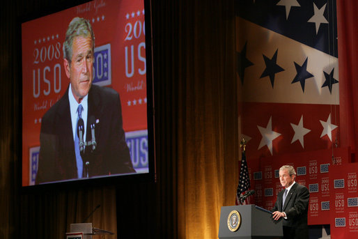 President George W. Bush is seen on a large video screen as he addresses his remarks to guests Wednesday evening, Oct. 1, 2008, at the United Services Organization World Gala in Washington, D.C. White House photo by Chris Greenberg