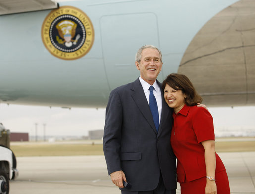 President George W. Bush hugs Freedom Corps greeter Sonya McDonald upon his arrival Monday, Oct. 6, 2008, in San Antonio, Texas. In January 2006, while her husband was deployed to Iraq, Mrs. McDonald spearheaded a fundraising effort to benefit Fisher House. Her goal was to raise $200,000 between Memorial Day and Independence Day 2006. She developed and implemented a marketing plan and solicited help from local businesses and organizations to generate donations. White House photo by Eric Draper