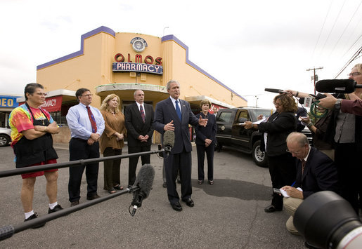 President George W. Bush and Mrs. Laura Bush are joined by local small business leaders for remarks on the economy Monday, Oct. 6, 2008, outside Olmos Pharmacy in San Antonio, Texas. White House photo by Eric Draper