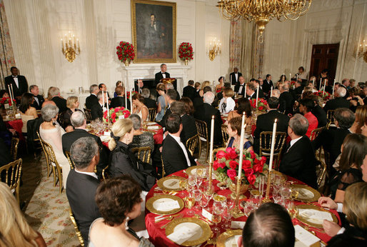 President George W. Bush addresses his remarks to invited guests Monday evening, Oct. 13, 2008, during the State Dinner in honor of Italian Prime Minister Silvio Berlusconi's visit to the White House. White House photo by Chris Greenberg