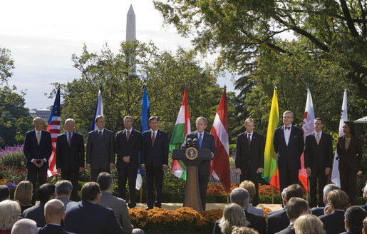 Joined on stage by U.S. Secretary of State Condoleezza Rice, Director Michael Chertoff of the Department of Homeland Security, left, and ambassadors of countries joining the Visa Waiver program, President George W. Bush delivers a statement on the program Friday, Oct. 17, 2008, in the Rose Garden of the White House. Said the President, "I'm pleased to stand with the representatives of seven countries -- the Czech Republic, Estonia, Hungary, Latvia, Lithuania, Slovakia, and South Korea -- that have met the requirements to be admitted to the United States Visa Waiver Program. Soon the citizens of these nations will be able to travel to the United States for business or tourism without a visa. I congratulate these close friends and allies on this achievement, and I thank you for joining us here." White House photo by Joyce N. Boghosian