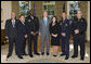 President George W. Bush poses for a photo with the recipients of the Public Safety Officer Medal of Valor Wednesday, Oct. 22, 2008, in the Oval Office at the White House. The Medal of Valor is awarded to public safety officers for extraordinary valor above and beyond the call of duty. White House photo by Chris Greenberg