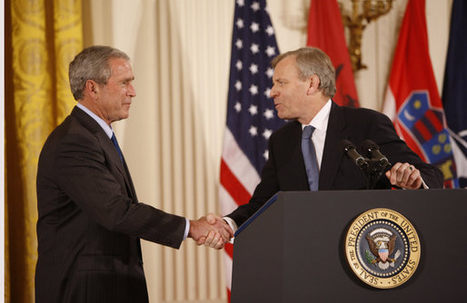 President George W. Bush shakes hands with NATO Secretary General Jaap De Hoop Scheffer Friday, Oct. 24, 2008 in the East Room of the White House, following an address honoring President Bush's support of the NATO accession protocols in support of the nations of Albania and Croatia to join the NATO alliance. White House photo by Eric Draper
