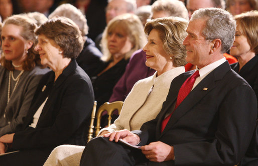 President George W. Bush and Mrs. Laura Bush listen Monday evening, Oct. 27, 2008 in the East Wing of the White House, to the performance of Theodore Roosevelt impersonator Joe Wiegand, during a celebration of the 150th birthday of Theodore Roosevelt. White House photo by Chris Greenberg