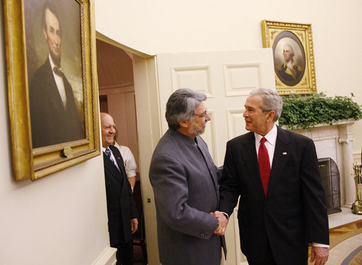 President George W. Bush welcomes President Fernando Lugo of Paraguay to the Oval Office, Monday, Oct. 27, 2008, for their meeting at the White House. White House photo by Eric Draper