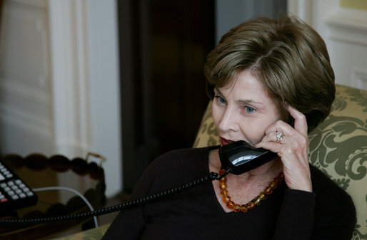Mrs. Laura Bush speaks on the phone with Michelle Obama Wednesday, Nov. 5, 2008 in the family residence at the White House. Mrs. Bush assured Mrs. Obama that they will enjoy living at the White House, and that it is a wonderful place to raise a family. Also Mrs. Bush extended an invitation to the Obama family to visit the White House. White House photo by Joyce N. Boghosian