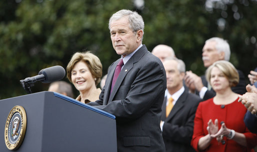 With Mrs. Laura Bush, the Vice President and Mrs. Cheney and Cabinet secretaries looking on, President George W. Bush addresses his staff Thursday, Nov. 6, 2008, on the South Lawn of the White House. Said the President, "As we head into this final stretch, I ask you to remain focused on the goals ahead. I will be honored to stand with you at the finish line." White House photo by Eric Draper