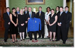 President George W. Bush poses with members of the University of Alaska Fairbanks Men's and Women's Rifle Team Wednesday, Nov. 12, 2008, during a photo opportunity with 2008 NCAA Sports Champions at the White House White House photo by Chris Greenberg