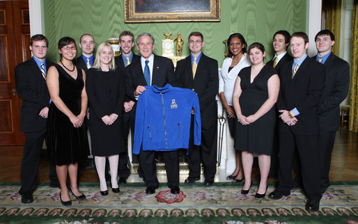 President George W. Bush poses with members of the University of Alaska Fairbanks Men's and Women's Rifle Team Wednesday, Nov. 12, 2008, during a photo opportunity with 2008 NCAA Sports Champions at the White House White House photo by Chris Greenberg