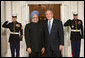 President George W. Bush welcomes Prime Minister Manmohan Singh of India to the White House Friday, Nov. 14, 2008, for the dinner marking the opening of the Summit on Financial Markets and World Economy. White House photo by Chris Greenberg