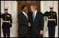 President George W. Bush welcomes President Kgalema Motlanthe of South Africa to the White House Friday, Nov. 14, 2008, for the dinner marking the opening of the Summit on Financial Markets and World Economy. White House photo by Chris Greenberg
