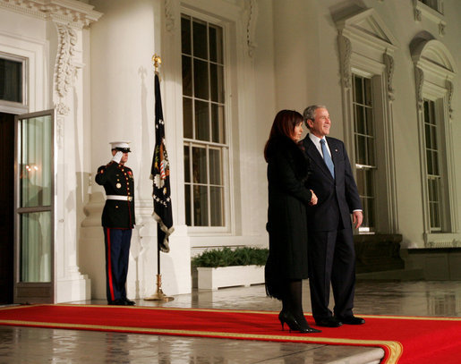 President George W. Bush greets President Cristina Fernandez de Kirchner of Argentina on the North Portico of the White House Friday, Nov. 14, 2008, before a dinner to open the Summit on Financial Markets and World Economy. White House photo by Joyce N. Boghosian