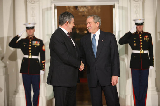 President George W. Bush shakes hands with Prime Minister Gordon Brown, of the United Kingdom, as he's welcomed to the White House Friday, Nov. 14, 2008, for a dinner to open the Summit on Financial Markets and World Economy. White House photo by Chris Greenberg