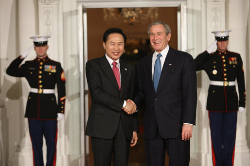 President George W. Bush greets Republic of Korean President Lee Myung-bak Friday, Nov. 14, 2008, upon his arrival for dinner with Summit on Financial Markets and World Economy Leaders at the White House. White House photo by Chris Greenberg