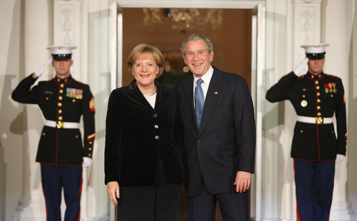 President George W. Bush greets German Chancellor Angela Merkel Friday, Nov. 14, 2008, upon her arrival for dinner with Summit on Financial Markets and World Economy Leaders at the White House. White House photo by Chris Greenberg
