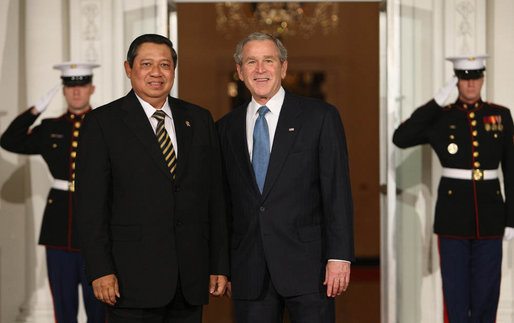 President George W. Bush greets President Susilo Bambang Yudhoyono of Indonesia Friday, Nov. 14, 2008, for dinner at the White House marking the opening of the Summit on Financial Markets and World Economy. White House photo by Chris Greenberg