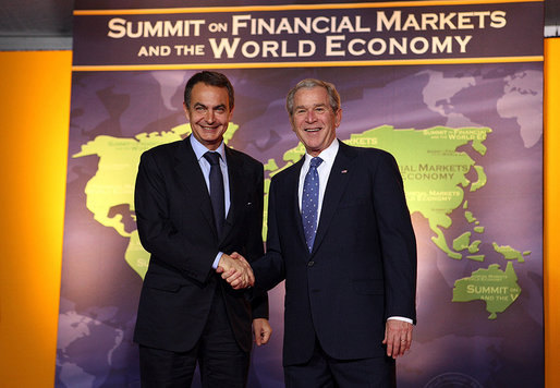 President George W. Bush welcomes Spain's President Jose Luis Rodriguez Zapatero, a represntative of the European Union, to the Summit on Financial Markets and the World Economy Saturday, Nov. 15, 2008, at the National Building Museum in Washington, D.C. White House photo by Chris Greenberg