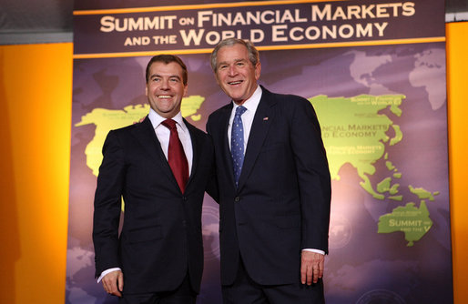 President George W. Bush welcomes Russian Federation President Dmitry Medvedev to the Summit on Financial Markets and the World Economy Saturday, Nov. 15, 2008, at the National Building Museum in Washington, D.C. White House photo by Chris Greenberg