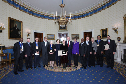 President George W. Bush and Mrs. Laura Bush stand with the recipients of the 2008 National Medal of Arts and Presidential Citizen Medal recipients in the Blue Room at the White House Monday, Nov., 17, 2008. Pictured from left, Henry 'Hank' Jones, Jr., jazz musician; Wayne Reynolds, president of the board of the Ford's Theatre Society; Stan Lee, legendary comic book creator; Paul Tetreault, director of the Ford's Theatre Society; Olivia de Havilland, actress; Carla Maxwell, artistic director of Jose Limon Dance Foundation; Hazel O'Leary, president of Fisk University and Paul Kwami, musical director for Fisk University Jubilee Singers; Dana Gioia, chairman of the National Endowment for the Arts; Adair Wakefield Margo, chairman for the President's Committee on Arts and Humanities; Jesus Moroles, sculptor; and Robert Capanna, of the Presser Foundation. White House photo by Chris Greenberg