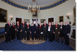 President George W. Bush and Mrs. Laura Bush stand with the recipients of the 2008 National Humanities Medal in the Blue Room at the White House Monday, Nov., 17, 2006. Pictured from left, Thomas A. Saunders III, president, and Jordan Horner Saunders, Board of Directors, North Shore Long Island Jewish Health Systems; Albert Marrin, author; Richard Brookhiser, Senior Editor, National Review; Harold Holzer, Senior Vice President for External Affairs, Metropolitan Museum of Art; Gabor S. Boritt, Director, Civil War Institute, Gettysburg College; Milton J. Rosenberg, WGN Radio Chicago; Myron Magnet, editor, City Journal; Adair Wakefield Margo, Presidential Citizen Medal recipient; Robert H. Smith, president, Vornado/Charles E. Smith; Laurie Norton, Director and CEO, Norman Rockwell Museum; Bruce Cole, Presidential Citizen Medal recipient. White House photo by Chris Greenberg
