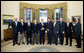 President George W. Bush stands with members of the U.S. Ryder Cup Team Monday, Nov. 17, 2008, in the Oval Office of the White House. The Ryder Cup is awarded biennially in a golf championship between the United States and Europe. The U.S. won the 2008 Cup by five points in September, the largest margin of victory since 1981. White House photo by Chris Greenberg