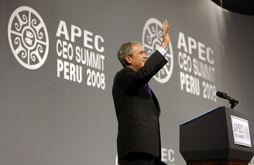 President George W. Bush waves to the audience after delivering his address to the APEC CEO Summit 2008 in Lima, Peru. Said the President in wrapping up his remarks, "Thanks for letting me come by. Que Dios le bendiga. God bless." White House photo by Eric Draper