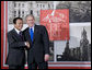 President George W. Bush and Prime Minister Taro Aso of Japan pause for photographs prior to their meeting Saturday, Nov. 22, 2008, in Lima, Peru. White House photo by Eric Draper