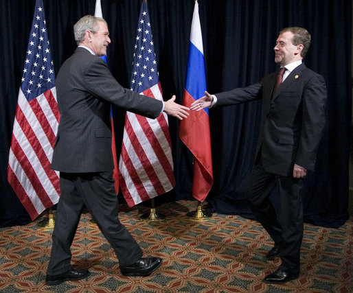President George W. Bush greets President Dmitriy Medvedev of Russia prior to their meeting Saturday, Nov. 22, 2008, at the Ministry of Defense Convention Center in Lima, Peru. White House photo by Eric Draper