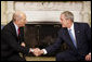 President George W. Bush and Prime Minister Ehud Olmert shake hands during the Israeli leader's visit Monday, Nov. 24, 2008, to the Oval Office. White House photo by Eric Draper