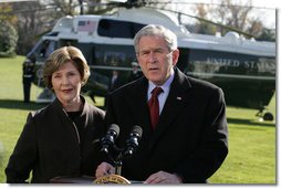 President George W. Bush and Laura Bush extend their condolences to those suffering from the terrorist attacks in Mumbai, India, upon their arrival to the White House Saturday, Nov. 29, 2008, in Washington DC. White House photo by Joyce N. Boghosian