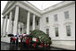 Mrs. Laura Bush welcomes the arrival of the official White House Christmas tree Sunday, Nov. 30, 2008, to the North Portico of the White House. The Fraser Fir tree, from the River Ridge Farms in Crumpler, N.C., will be on display in the Blue Room of the White House for the 2008 Christmas season. Joining Mrs. Bush, from left are, Mark Steelhammer, president of National Christmas Tree Association, his wife Luanne, Carol Pennington, Ann Estes, Russell Estes of River Ridge Farms in Crumpler, NC, Michelle Davis, and Jessie Davis of River Ridge Farms in Crumpler, NC. White House photo by Joyce N. Boghosian