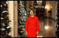 Mrs. Laura Bush stands in the East Room of the White House Wednesday, Dec. 3, 2008, as she reveals the 2008 White House holiday theme, "A Red, White and Blue Christmas" to approximately 120 members of the media during the White House Holiday Press Preview. White House photo by Chris Greenberg