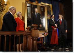 President George W. Bush shakes hands with artist Mark Carder Saturday, Dec. 6, 2008, at the unveiling of the Union League of Philadelphia's Portrait of a President. Looking on at left are Bruce and Eileen Hooper, Commissioners of the portrait, which will join 26 others of American Presidents in the Union League's Presidential Portrait Collection.  White House photo by Eric Draper
