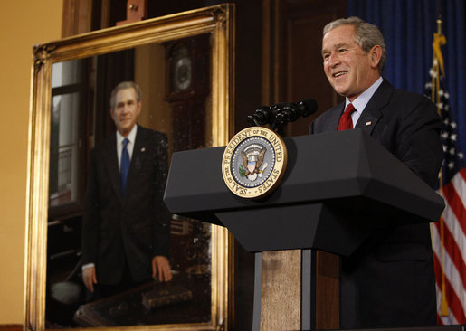 President George W. Bush stands next to his portrait as he delivers remarks Saturday, Dec. 6, 2008, to the Union League of Philadelphia. Founded in 1862, the Union League has hosted U.S. Presidents, heads of state, industrialists, entertainers and visiting dignitaries from around the globe. The portrait, painted by Mark Carder and presented by the League, will become part of its Presidential Portrait Collection. White House photo by Eric Draper