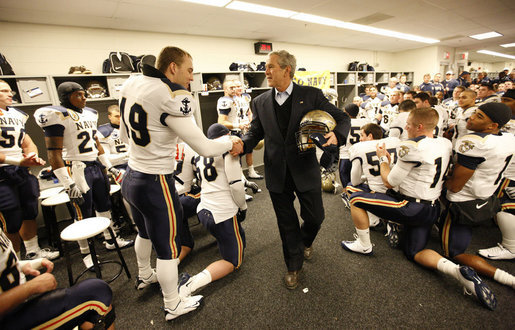 President George W. Bush shakes the hand of Navy outside linebacker Craig Schaefer of Fairfax, Va., prior to the start Saturday, Dec. 6, 2008, of the 2008 Army-Navy game at Lincoln Financial Field in Philadelphia. White House photo by Eric Draper