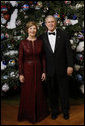 President George W. Bush and Mrs. Laura Bush pose for their 2008 holiday portrait Sunday, Dec. 7, 2008, in the Blue Room of the White House. White House photo by Eric Draper