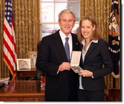 President George W. Bush stands with Wendy Kopp after presenting her with the 2008 Presidential Citizens Medal Wednesday, Dec. 10, 2008, in the Oval Office of the White House. White House photo by Chris Greenberg