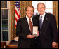 President George W. Bush stands with Ward Brehm after presenting him with the 2008 Presidential Citizens Medal Wednesday, Dec. 10, 2008, in the Oval Office of the White House. White House photo by Chris Greenberg