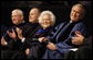President George W. Bush enjoys the moment with his mom, Mrs. Barbara Bush, and dad, former President George H.W. Bush, as they sit on stage at Reed Arena on the campus of Texas A&M University where the President addressed the 3,700 graduates of the school's Winter Class of 2008. White House photo by Eric Draper