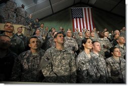 Troops at Bagram Air Base listen to remarks by President George W. Bush early Monday, Dec. 15, 2008, after his arrival in Afghanistan. The President told his audience, "I am confident we will succeed in Afghanistan because our cause is just, our coalition and Afghan partners are determined; and I am confident because I believe freedom is a gift of an Almighty to every man, woman, and child on the face of the Earth. Above all, I know the strength and character of you all. As I conclude this final trip, I have a message to you, and to all who serve our country: Thanks for making the noble choice to serve and protect your fellow Americans."  White House photo by Eric Draper