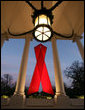 A red ribbon adorns the North Portico of the White House Friday, Nov. 30, 2007, in recognition of World AIDS Day and the commitment by President George W. Bush and his administration to fighting and preventing HIV/AIDS in America. White House photo by Eric Draper
