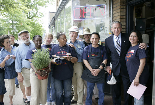 President George W. Bush stands with employees during a visit to Frager's Hardware store in the Capitol Hill neighborhood of Washington, D.C., Friday, May 5, 2006. White House photo by Eric Draper