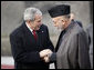 President George W. Bush bids farewell to President Hamid Karzai of Afghanistan as he prepares to depart the presidential palace Monday, Dec. 15, 2008, in Kabul. White House photo by Eric Draper