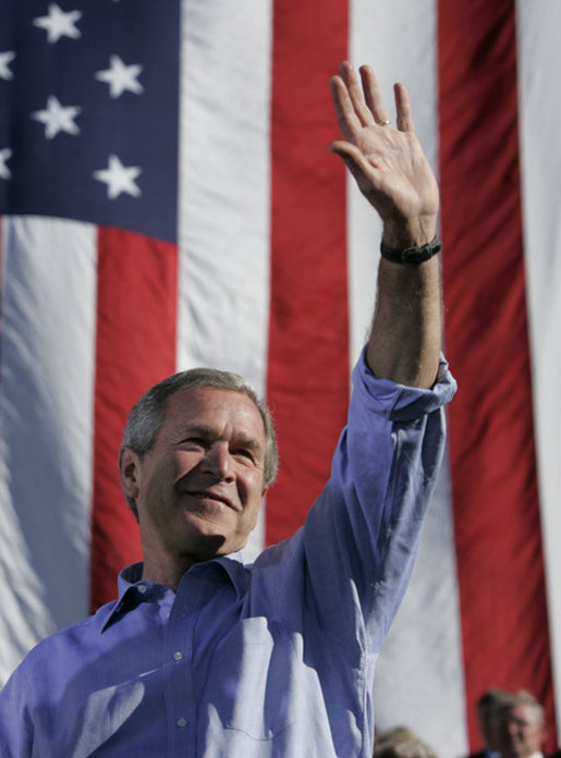 President George W. Bush waves after remarks Sept. 23, 2004, at a Victory 2004 rally in Bangor, Maine. White House photo by Paul Morse