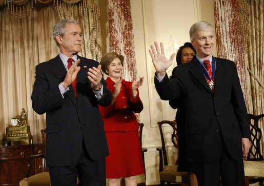 President George W. Bush and Mrs. Laura Bush applaud as U.S. Ambassador to Iraq Ryan Crocker acknowledges the audience after receiving the Presidential Medal of Freedom Thursday, Jan. 15, 2009, during a ceremony to commemorate foreign policy achievements at the U.S. Department of State. White House photo by Eric Draper