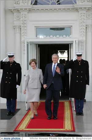 President George W. Bush and Mrs. Laura Bush walk out on the North Portico of the White House Tuesday morning, Jan. 20, 2008, to welcome President-Elect Barack Obama to the White House. White House photo by Joyce N. Boghosian